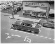 Cars in front of drug store